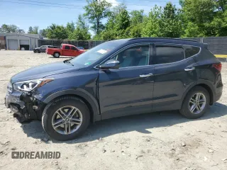 2017 Hyundai Santa Fe 2.4L z VIN 5NMZUDLB7HH028678, wystawiony jako Copart lot #57557855 z przebiegiem 102 049 mil mil oraz Szkoda całkowita • Salvage title. Historia ofert i sprzedaży dostępna na DreamBid. Obrazek 1.