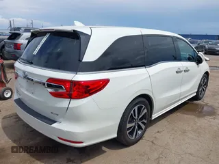 2019 Honda Odyssey Elite z VIN 5FNRL6H91KB110452, wystawiony jako IAAI lot #42630514 z przebiegiem 64 349 mil mil oraz . Historia ofert i sprzedaży dostępna na DreamBid. Obrazek 4.