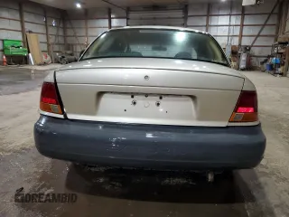 1998 Saturn SL with VIN 1G8ZH5284WZ283758, listed as a Copart auction lot 51630555 with 200,690 mi miles and Salvage title. Bid and sale history available at DreamBid. Image 6.