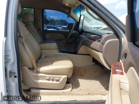 2012 Chevrolet Tahoe LT z VIN 1GNSCBE00CR176056, wystawiony jako IAAI lot #42091159 z przebiegiem 216 650 mil mil oraz . Historia ofert i sprzedaży dostępna na DreamBid. Obrazek 5.