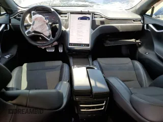 2017 Tesla Model S 100D с VIN 5YJSA1E28HF233322, выставлен на аукционе Copart как лот 62357925 с пробегом 110 383 миль миль и Списание • Salvage title. История ставок и продаж доступна на DreamBid. Изображение 8.