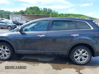2014 Mazda CX-9 Touring with VIN JM3TB3CV9E0426767, listed as a IAAI auction lot 42301021 with 129,497 mi miles and . Bid and sale history available at DreamBid. Image 15.