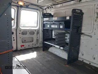 2014 Ford Econoline Cargo Commercial with VIN 1FTNE2EL6EDA22641, listed as a IAAI auction lot 42156425 with 233,745 mi miles. Bid and sale history available at carsss.com. Image 8.