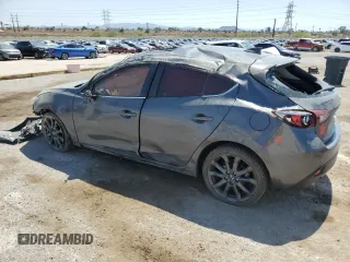 2016 Mazda 3 S Touring with VIN JM1BM1M3XG1342809, listed as a Copart auction lot 61915845 with 141,227 mi miles and Salvage title. Bid and sale history available at DreamBid. Image 2.