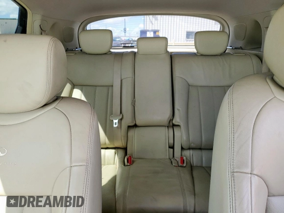 2014 Infiniti QX70 z VIN JN8CS1MU7EM450565, wystawiony jako Copart lot #55931325 z przebiegiem 159 813 mil mil oraz Szkoda całkowita • Salvage title. Historia ofert i sprzedaży dostępna na DreamBid. Obrazek 10.
