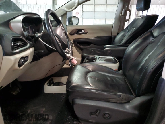 2021 Chrysler Pacifica Touring L with VIN 2C4RC1BGXMR588001, listed as a Copart auction lot 54562505 with 128,350 mi miles and Salvage title. Bid and sale history available at DreamBid. Image 7.