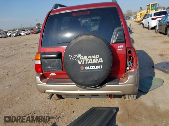 2002 Suzuki Grand Vitara JLX z VIN JS3TD62V824152943, wystawiony jako IAAI lot #41668395 z przebiegiem 104 191 mil mil oraz . Historia ofert i sprzedaży dostępna na DreamBid. Obrazek 17.