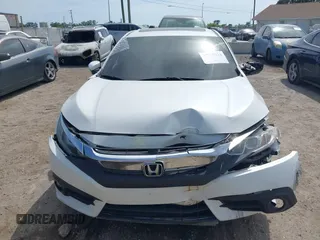 2018 Honda Civic EX-T z VIN 19XFC1F3XJE004123, wystawiony jako IAAI lot #42090933 z przebiegiem 81 228 mil mil oraz . Historia ofert i sprzedaży dostępna na DreamBid. Obrazek 12.