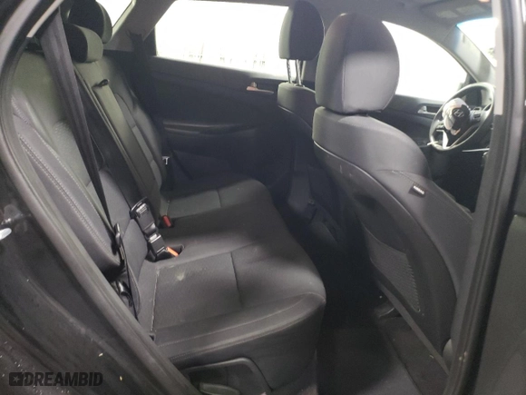 2019 Hyundai Tucson SE with VIN KM8J23A43KU868793, listed as a Copart auction lot 44521105 with 100,856 mi miles and Salvage Title. Bid and sale history available at carsss.com. Image 10.