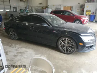 2017 Audi A7 Premium Plus с VIN WAUW2AFC0HN050033, выставлен на аукционе Copart как лот 51229005 с пробегом 110 264 миль миль и Списание • Salvage title. История ставок и продаж доступна на DreamBid. Изображение 4.