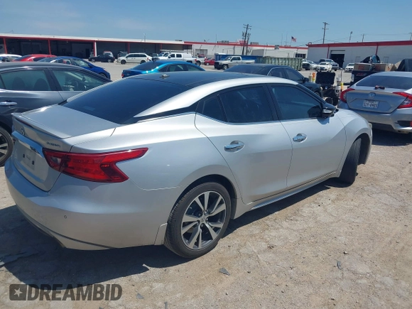 2016 Nissan Maxima SL with VIN 1N4AA6AP1GC430988, listed as a IAAI auction lot 42047844 with 122,685 mi miles and . Bid and sale history available at DreamBid. Image 4.