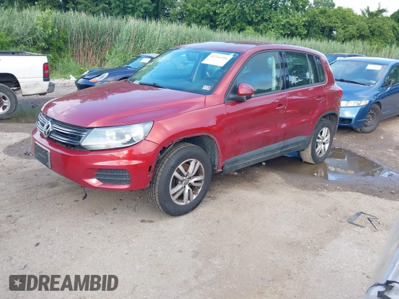 2012 Volkswagen Tiguan SE with VIN WVGAV7AX6CW090956, listed as a IAAI auction lot 42716526 with 227,665 mi miles and . Bid and sale history available at DreamBid. Image 2.