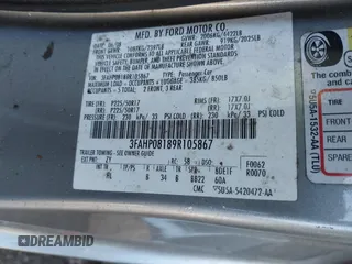 2009 Ford Fusion SEL with VIN 3FAHP08189R105867, listed as a IAAI auction lot 41649133 with 188,691 mi miles. Bid and sale history available at carsss.com. Image 9.