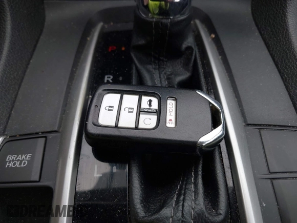 2018 Honda Civic EX with VIN 2HGFC2F71JH502564, listed as a IAAI auction lot 41933157 with 56,696 mi miles and . Bid and sale history available at DreamBid. Image 11.