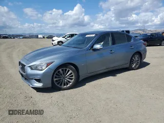 2019 Infiniti Q50 Luxe с VIN JN1EV7APXKM517090, выставлен на аукционе Copart как лот 56740215 с пробегом 69 702 миль миль и Списание • Salvage title. История ставок и продаж доступна на DreamBid. Изображение 1.