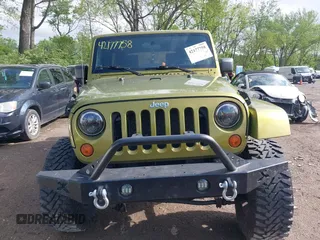 2008 Jeep Wrangler Unlimited Sahara with VIN 1J4GA59148L545255, listed as a IAAI auction lot 42177758 with 155,953 mi miles and . Bid and sale history available at DreamBid. Image 13.