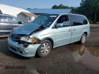 2003 Honda Odyssey EX-L z VIN 2HKRL18033H501741, wystawiony jako Copart lot #60496865 z przebiegiem Nie podano mil oraz Szkoda całkowita • Salvage title. Historia ofert i sprzedaży dostępna na DreamBid. Obrazek 1.