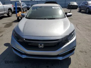 2020 Honda Civic LX z VIN 19XFC2F6XLE209685, wystawiony jako Copart lot #59595335 z przebiegiem Nie podano mil oraz Szkoda całkowita • Salvage title. Historia ofert i sprzedaży dostępna na DreamBid. Obrazek 5.