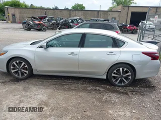 2017 Nissan Altima SV with VIN 1N4AL3AP3HC151424, listed as a IAAI auction lot 42697536 with 157,066 mi miles and . Bid and sale history available at DreamBid. Image 14.