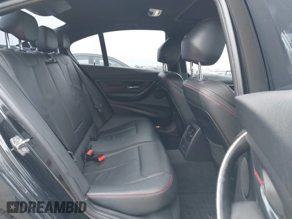 2013 BMW 3 Series 328i with VIN WBA3C1G59DNR47877, listed as a IAAI auction lot 41640493 with 106,689 mi miles and . Bid and sale history available at DreamBid. Image 8.