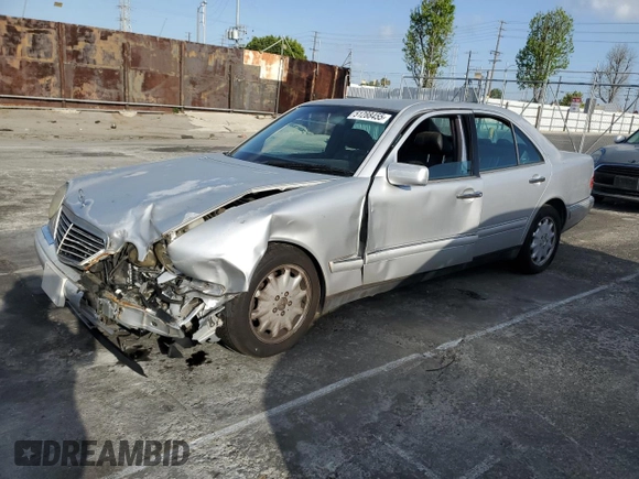 1998 Mercedes-Benz E 320 with VIN WDBJF25F3WA689755, listed as a Copart auction lot 51288455 with 124,157 mi miles and Salvage Title. Bid and sale history available at DreamBid. Image 1.