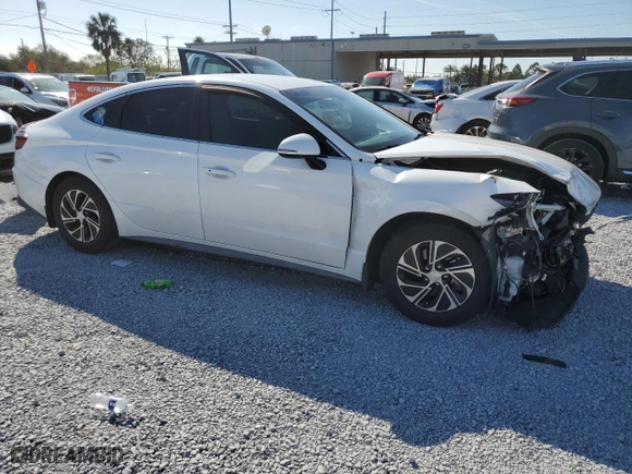 2021 Hyundai Sonata Hybrid Blue with VIN KMHL24JJ7MA030226, listed as a Copart auction lot 43849655 with 49,557 mi miles and Salvage Title. Bid and sale history available at carsss.com. Image 4.