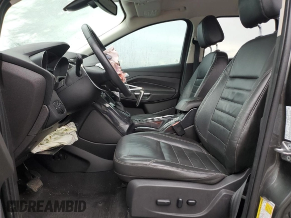 2015 Ford Escape Titanium with VIN 1FMCU9J92FUA62323, listed as a Copart auction lot 85826724 with 108,315 mi miles and Salvage Title. Bid and sale history available at DreamBid. Image 7.
