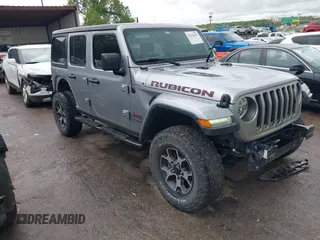2018 Jeep Wrangler Unlimited Rubicon z VIN 1C4HJXFG4JW174603, wystawiony jako IAAI lot #42202302 z przebiegiem 120 229 mil mil oraz . Historia ofert i sprzedaży dostępna na DreamBid. Obrazek 1.