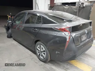2018 Toyota Prius Two with VIN JTDKARFU6J3553871, listed as a IAAI auction lot 41577636 with 118,715 mi miles. Bid and sale history available at carsss.com. Image 3.