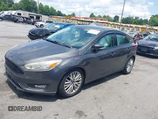 2016 Ford Focus Titanium with VIN 1FADP3N20GL275763, listed as a IAAI auction lot 42511959 with 124,891 mi miles and . Bid and sale history available at DreamBid. Image 17.