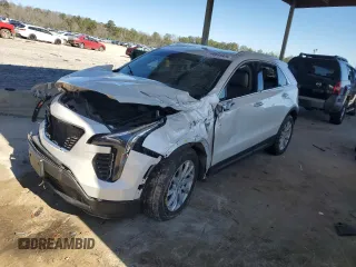 2021 Cadillac XT4 FWD Luxury z VIN 1GYAZAR47MF023407, wystawiony jako Copart lot #88633325 z przebiegiem 77 353 mil mil oraz Szkoda całkowita • Salvage title. Historia ofert i sprzedaży dostępna na DreamBid. Obrazek 1.
