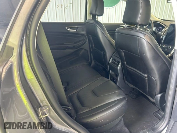 2021 Ford Edge Titanium z VIN 2FMPK3K97MBA51131, wystawiony jako IAAI lot #42529673 z przebiegiem 92 302 mil mil oraz . Historia ofert i sprzedaży dostępna na DreamBid. Obrazek 2.