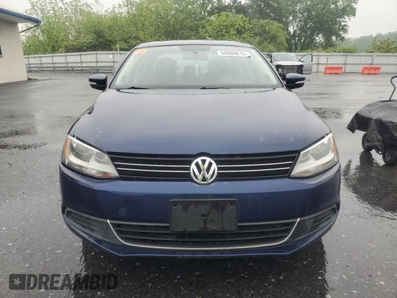2013 Volkswagen Jetta TDI w/Premium with VIN 3VW3L7AJ2DM387655, listed as a Copart auction lot 56869615 with Not provided miles and Clean title. Bid and sale history available at DreamBid. Image 5.