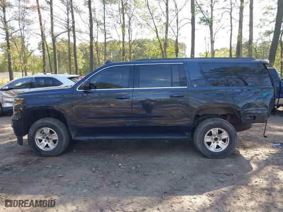 2019 Chevrolet Suburban LT with VIN 1GNSKHKC5KR333566, listed as a IAAI auction lot 41996940 with 95,807 mi miles. Bid and sale history available at carsss.com. Image 15.