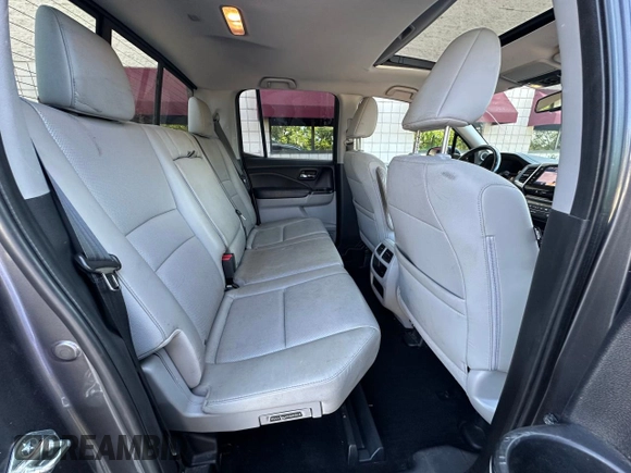2019 Honda Ridgeline RTL-E with VIN 5FPYK3F71KB009532, listed as a Copart auction lot 65827935 with 217,177 mi miles and Clean title. Bid and sale history available at DreamBid. Image 6.