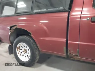 1999 Mazda B-Series Truck SX with VIN 4F4YR12C8XTM08476, listed as a IAAI auction lot 41864144 with 187,847 mi miles and . Bid and sale history available at DreamBid. Image 14.