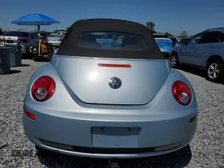 2009 Volkswagen Beetle S z VIN 3VWRF31Y29M407420, wystawiony jako Copart lot #52752405 z przebiegiem 147 982 mil mil oraz Czysty tytuł • Clean title. Historia ofert i sprzedaży dostępna na DreamBid. Obrazek 6.