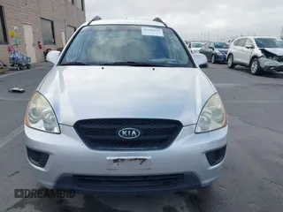 2009 Kia Rondo LX with VIN KNAFG528497222225, listed as a IAAI auction lot 42108192 with 113,040 mi miles. Bid and sale history available at carsss.com. Image 13.