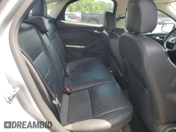 2015 Ford Focus Titanium with VIN 1FADP3J27FL267339, listed as a Copart auction lot 63395835 with 73,372 mi miles and Salvage title. Bid and sale history available at DreamBid. Image 10.
