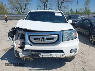 2011 Honda Pilot EX-L with VIN 5FNYF4H69BB091503, listed as a IAAI auction lot 42103011 with 246,816 mi miles and . Bid and sale history available at carsss.com. Image 12.