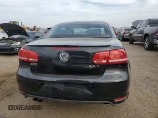 2015 Volkswagen Eos Komfort with VIN WVWBW8AH4FV001321, listed as a Copart auction lot 78718404 with 73,296 mi miles and Salvage Title. Bid and sale history available at DreamBid. Image 6.