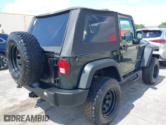 2010 Jeep Wrangler Sport with VIN 1J4AA2D17AL126737, listed as a IAAI auction lot 42237596 with 119,391 mi miles and . Bid and sale history available at carsss.com. Image 4.