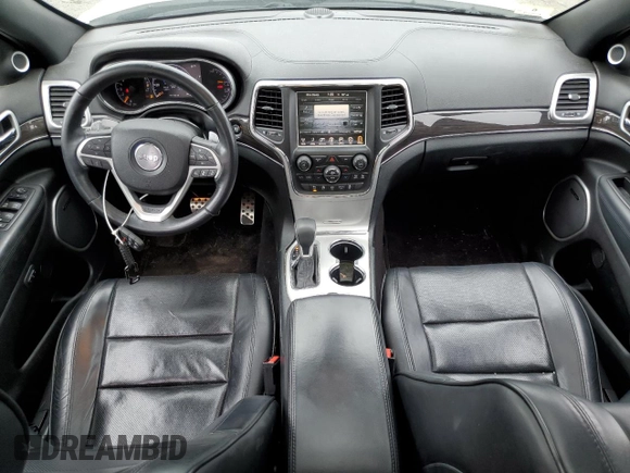 2016 Jeep Grand Cherokee Overland with VIN 1C4RJFCG3GC364485, listed as a Copart auction lot 60727935 with 101,742 mi miles and Salvage title. Bid and sale history available at DreamBid. Image 8.