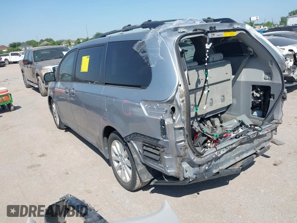 2012 Toyota Sienna XLE AAS with VIN 5TDYK3DC7CS185555, listed as a IAAI auction lot 42013098 with 140,969 mi miles. Bid and sale history available at carsss.com. Image 3.