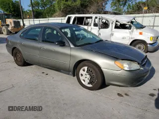 2003 Ford Taurus LX Standard with VIN 1FAFP52U13G243207, listed as a Copart auction lot 52763905 with 49,906 mi miles and Salvage title. Bid and sale history available at DreamBid. Image 4.
