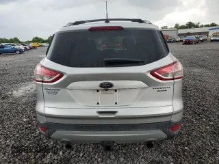 2013 Ford Escape Titanium with VIN 1FMCU9J94DUB00695, listed as a Copart auction lot 56633955 with 129,011 mi miles and Salvage title. Bid and sale history available at DreamBid. Image 6.