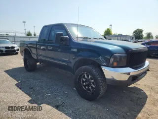 1999 Ford F-250 XL with VIN 1FTNX21FXXEC41173, listed as a Copart auction lot 65117905 with 303,358 mi miles and Clean title. Bid and sale history available at DreamBid. Image 4.