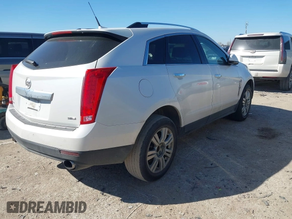 2012 Cadillac SRX Luxury Collection with VIN 3GYFNAE37CS597594, listed as a IAAI auction lot 41647807 with 193,836 mi miles and . Bid and sale history available at carsss.com. Image 4.