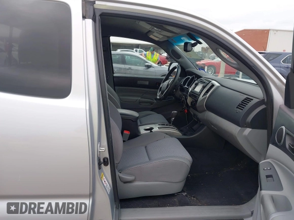2013 Toyota Tacoma with VIN 5TFUU4EN1DX065356, listed as a IAAI auction lot 41509219 with 122,520 mi miles and . Bid and sale history available at DreamBid. Image 5.