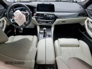 2020 BMW M5 z VIN WBSJF0C02LCE10800, wystawiony jako Copart lot #60674545 z przebiegiem Nie podano mil oraz Szkoda całkowita • Salvage title. Historia ofert i sprzedaży dostępna na DreamBid. Obrazek 8.